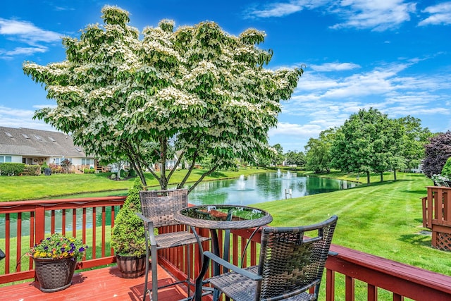 903 Constance Ln, Port Jefferson Station, NY 11776 - wooden deck featuring a water view and a lawn