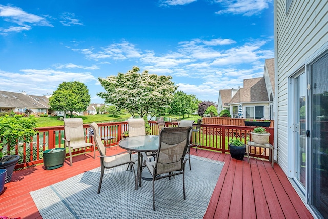 903 Constance Ln, Port Jefferson Station, NY 11776 - wooden terrace with a residential view and outdoor dining area