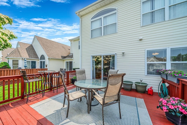 903 Constance Ln, Port Jefferson Station, NY 11776 - wooden terrace featuring outdoor dining space