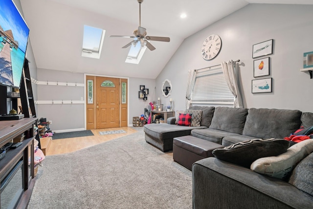13 Sunset Dr, Centereach, NY 11720 - living area with ceiling fan, vaulted ceiling, a skylight, and wood finished floors