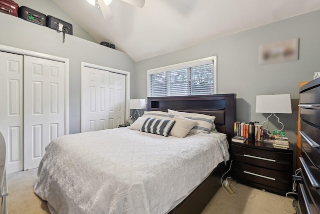 13 Sunset Dr, Centereach, NY 11720 - bedroom featuring multiple closets, light carpet, lofted ceiling, and a ceiling fan