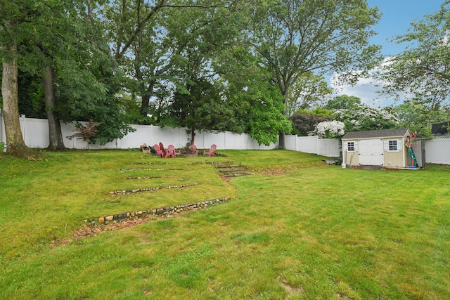 13 Sunset Dr, Centereach, NY 11720 - fenced backyard featuring a storage shed