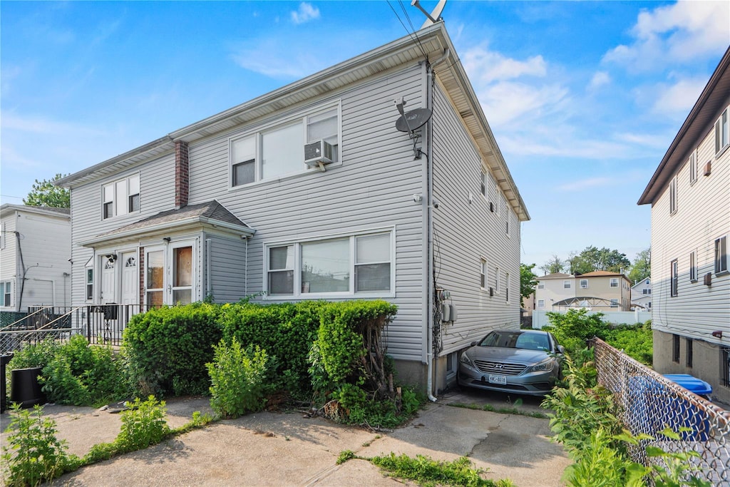 14019 Sutter Ave, South Ozone Park, NY 11436 - townhome / multi-family property featuring cooling unit