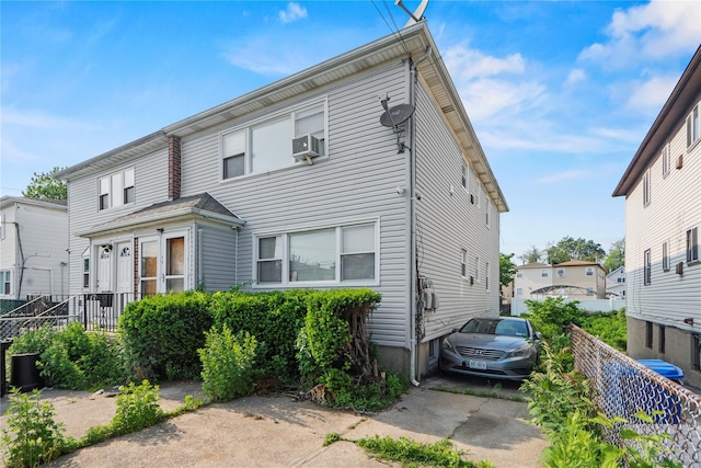 14019 Sutter Ave, South Ozone Park, NY 11436 - townhome / multi-family property featuring cooling unit