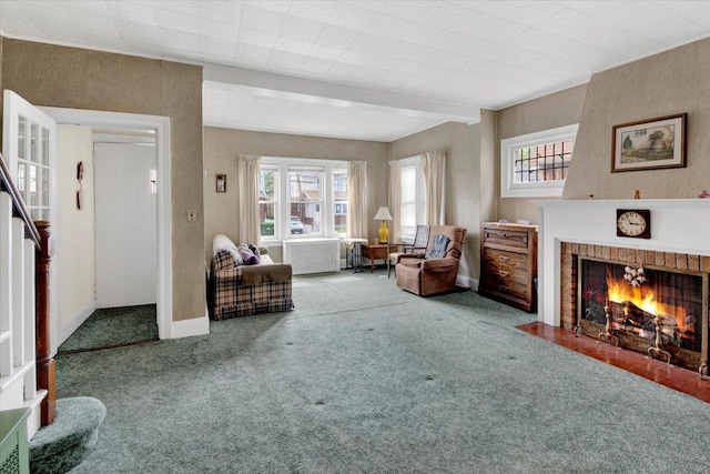 49 Boone St, Yonkers, NY 10704 - carpeted living room with healthy amount of natural light, radiator heating unit, and a brick fireplace