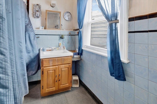 49 Boone St, Yonkers, NY 10704 - bathroom featuring tile walls and vanity