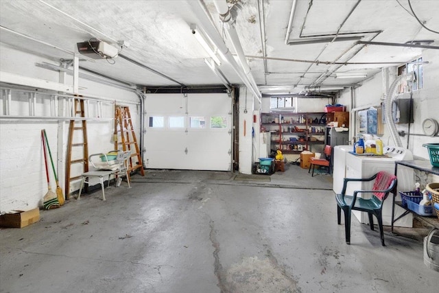 49 Boone St, Yonkers, NY 10704 - garage with a garage door opener and washer / dryer