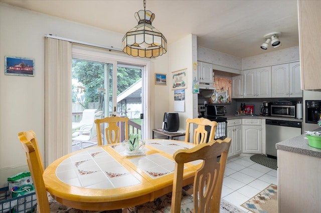 30 Nims Ave, West Babylon, NY 11704 - dining space featuring light tile patterned floors