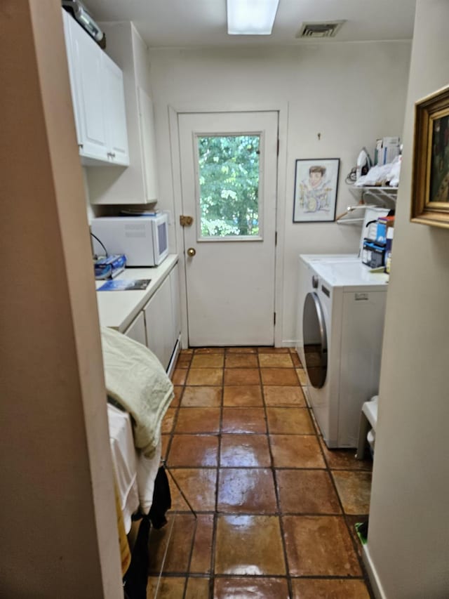 5 Sophia St, Monsey, NY 10952 - laundry area featuring cabinet space, washer and clothes dryer, and tile patterned flooring