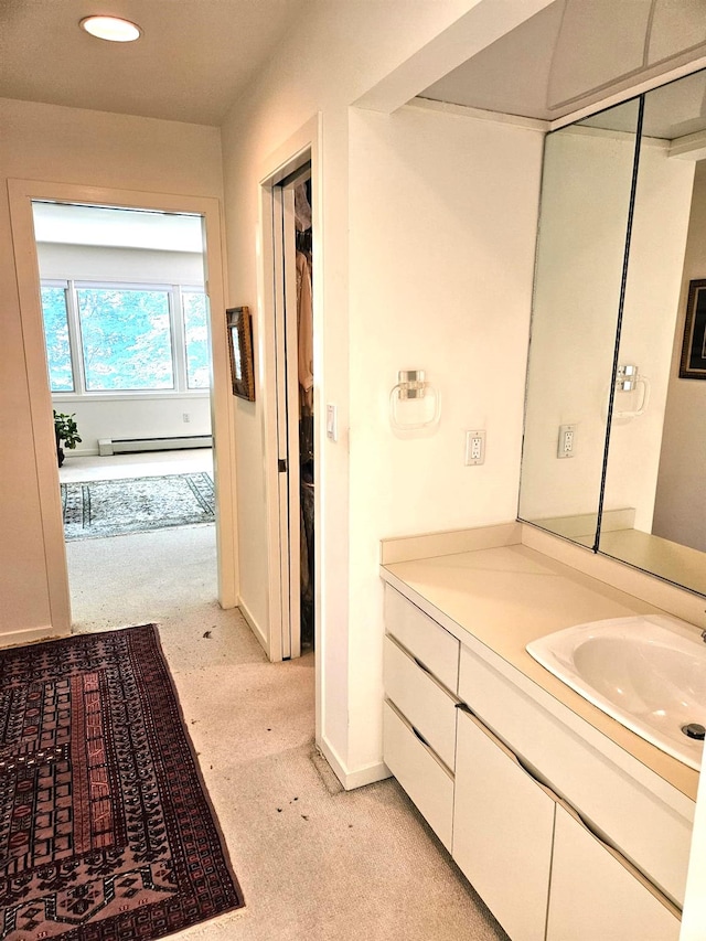 5 Sophia St, Monsey, NY 10952 - bathroom with vanity, a baseboard radiator, and recessed lighting