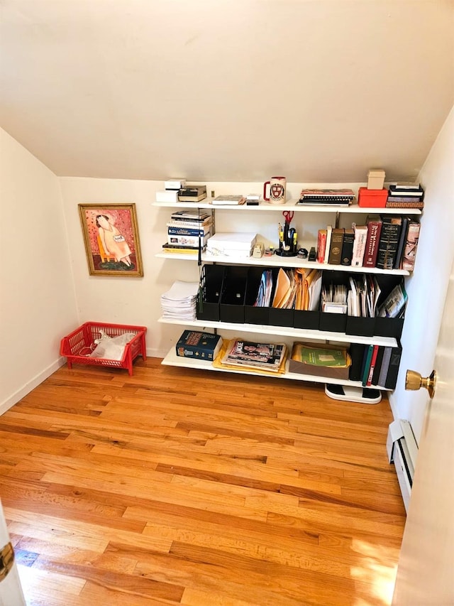 5 Sophia St, Monsey, NY 10952 - sitting room with baseboard heating and wood finished floors