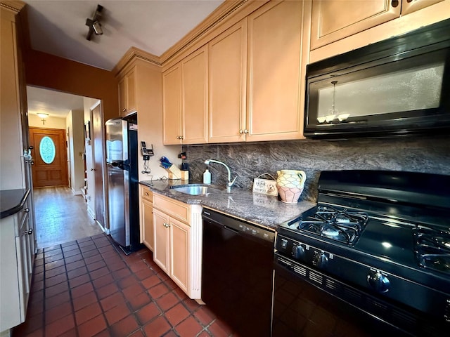 59-47 69th Ln Unit A, Maspeth, NY 11378 - kitchen featuring black appliances, dark tile patterned flooring, backsplash, and dark stone counters