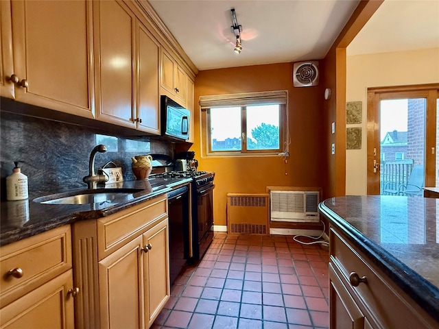 59-47 69th Ln Unit A, Maspeth, NY 11378 - kitchen featuring black appliances, decorative backsplash, tile patterned floors, and dark stone counters