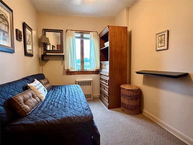 59-47 69th Ln Unit A, Maspeth, NY 11378 - carpeted bedroom featuring radiator heating unit and baseboards