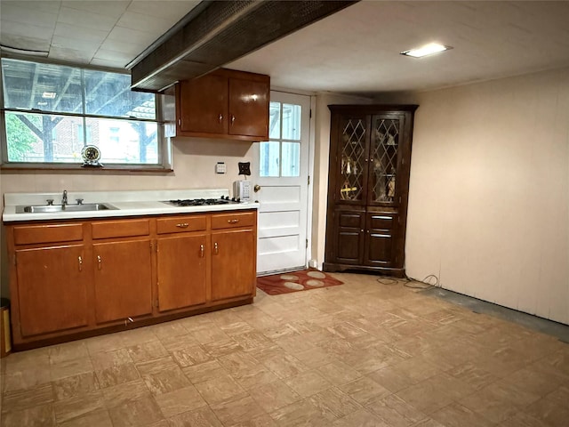 59-47 69th Ln Unit A, Maspeth, NY 11378 - kitchen with plenty of natural light, light countertops, light flooring, and gas cooktop