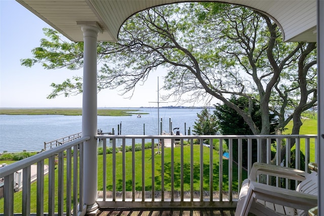 248 Delaware Ave, Island Park, NY 11558 - balcony with a water view and a dock