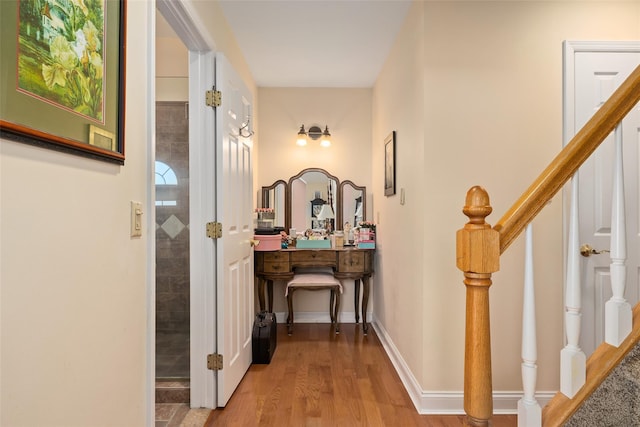248 Delaware Ave, Island Park, NY 11558 - hallway with stairway and wood finished floors