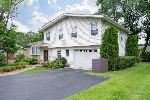 38 Balmoral Cres, White Plains, NY 10607 - split level home featuring an attached garage, driveway, and a front lawn
