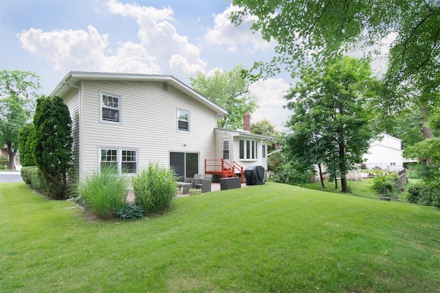 38 Balmoral Cres, White Plains, NY 10607 - rear view of property featuring a lawn and a chimney