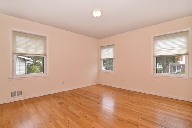 38 Balmoral Cres, White Plains, NY 10607 - unfurnished room featuring plenty of natural light and light wood-style floors