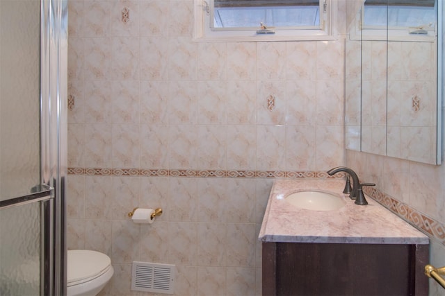 38 Balmoral Cres, White Plains, NY 10607 - bathroom with vanity, tile walls, and an enclosed shower