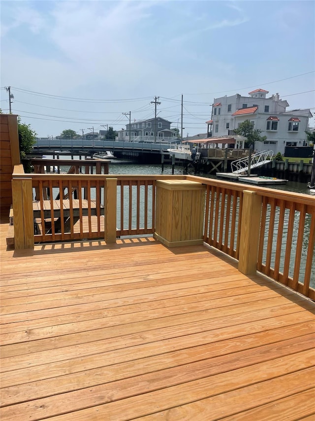 62 Clark St, Long Beach, NY 11561 - wooden deck featuring a water view