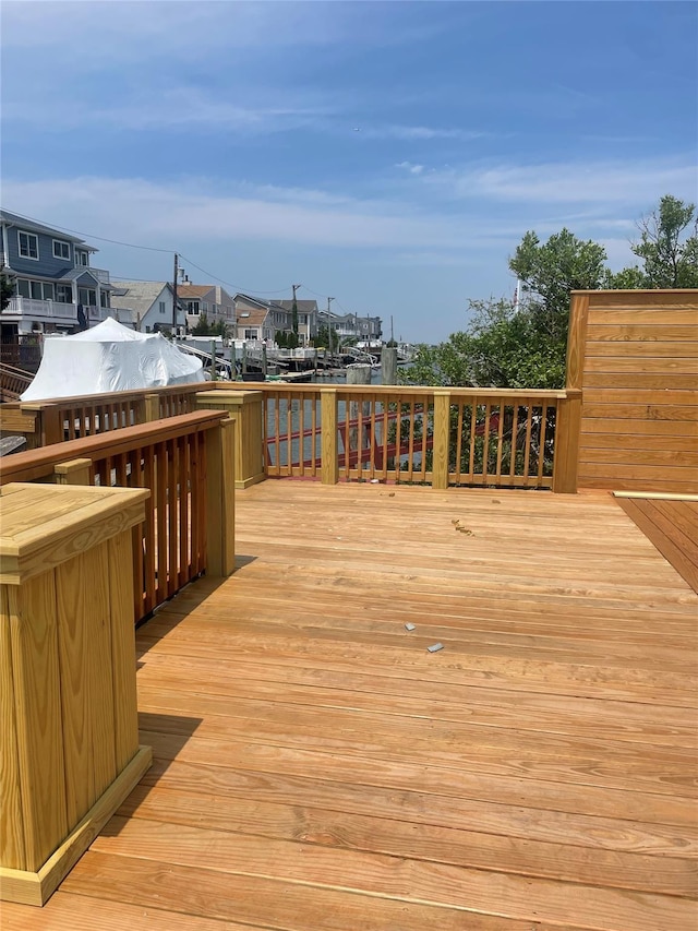 62 Clark St, Long Beach, NY 11561 - wooden deck featuring a residential view