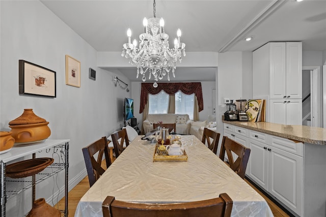 8 Valley View Ter, Suffern, NY 10901 - dining room with light wood finished floors, a chandelier, and recessed lighting