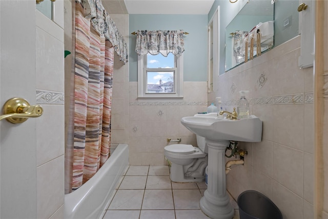 8 Valley View Ter, Suffern, NY 10901 - full bathroom featuring tile patterned floors, tile walls, wainscoting, and shower / tub combo with curtain