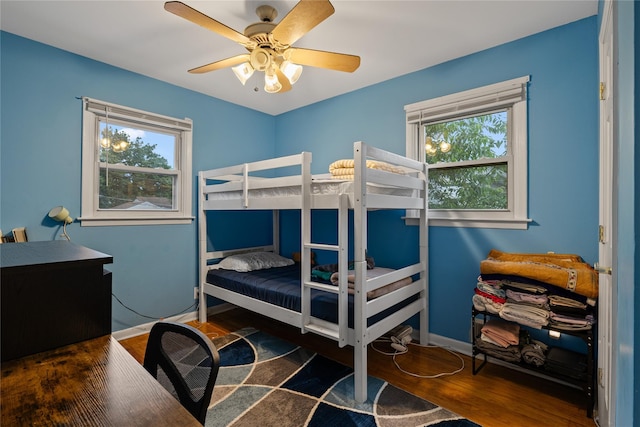 8 Valley View Ter, Suffern, NY 10901 - bedroom featuring multiple windows, wood finished floors, and a ceiling fan