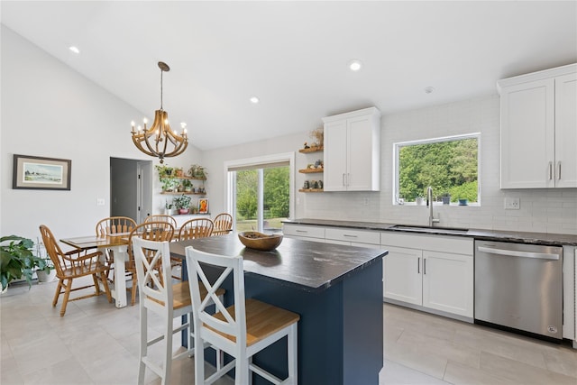 166 Williams Way S, Baiting Hollow, NY 11933 - kitchen featuring stainless steel dishwasher, open shelves, a chandelier, decorative backsplash, and white cabinetry