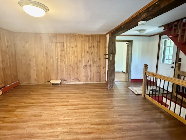 312 Coldenham Rd, Walden, NY 12586 - unfurnished room with wood finished floors, wood walls, and a smoke detector