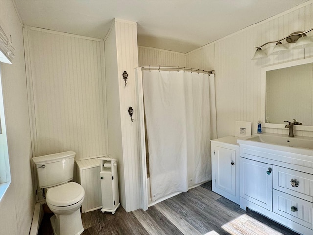 312 Coldenham Rd, Walden, NY 12586 - bathroom with wood finished floors, vanity, and curtained shower