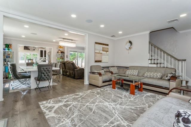 1 Howland Rd, East Rockaway, NY 11518 - living room with wood finished floors, plenty of natural light, recessed lighting, crown molding, and stairs
