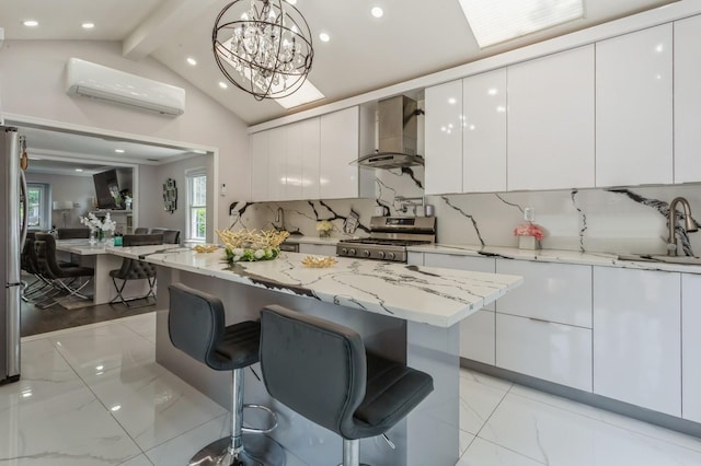1 Howland Rd, East Rockaway, NY 11518 - kitchen with wall chimney range hood, stove, a wall unit AC, modern cabinets, and recessed lighting