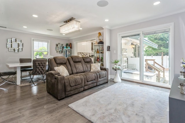 1 Howland Rd, East Rockaway, NY 11518 - living room featuring crown molding, wood finished floors, and recessed lighting