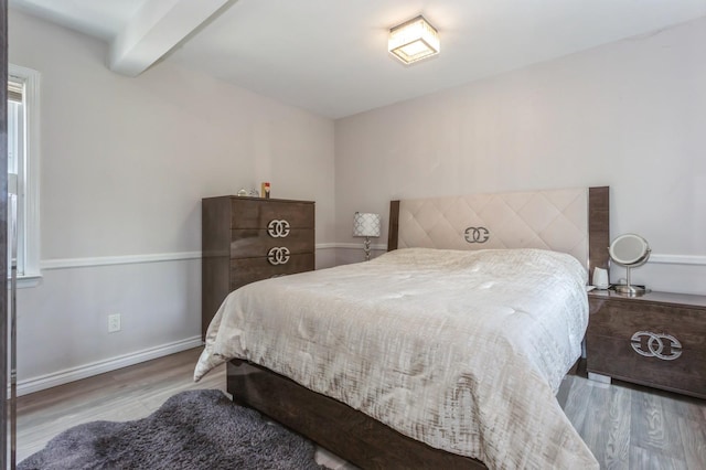 1 Howland Rd, East Rockaway, NY 11518 - bedroom featuring wood finished floors and baseboards