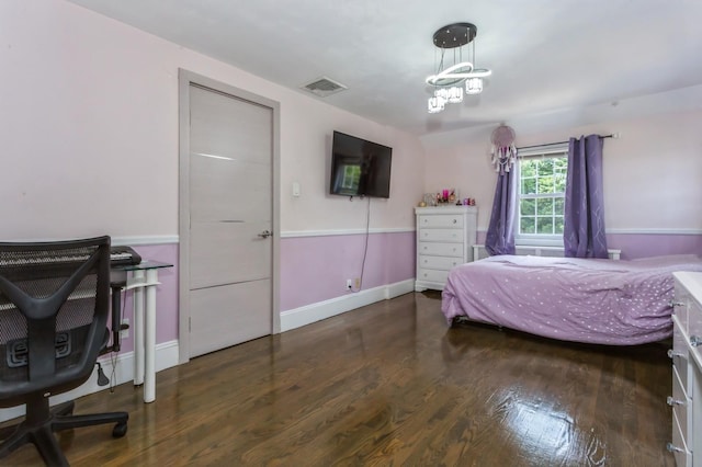 1 Howland Rd, East Rockaway, NY 11518 - bedroom with wood finished floors and baseboards