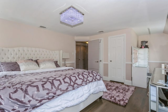1 Howland Rd, East Rockaway, NY 11518 - bedroom featuring wood finished floors