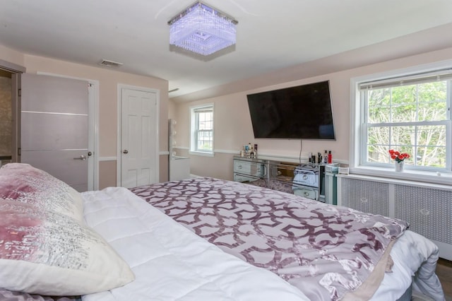 1 Howland Rd, East Rockaway, NY 11518 - bedroom with radiator heating unit