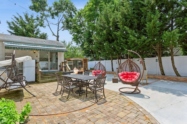 1 Howland Rd, East Rockaway, NY 11518 - fenced backyard with a patio area and outdoor dining area