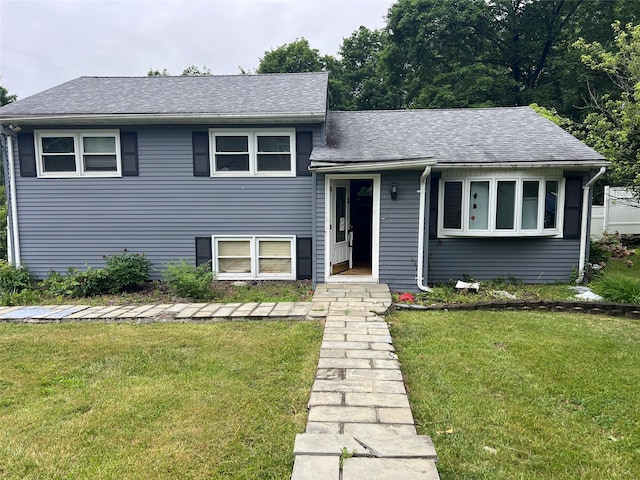22 Oriole Dr, Poughkeepsie, NY 12601 - split level home featuring a front yard and a shingled roof