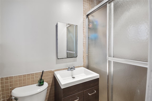 114 Cone Ave, Central Islip, NY 11722 - full bath featuring vanity, a shower stall, wainscoting, and tile walls