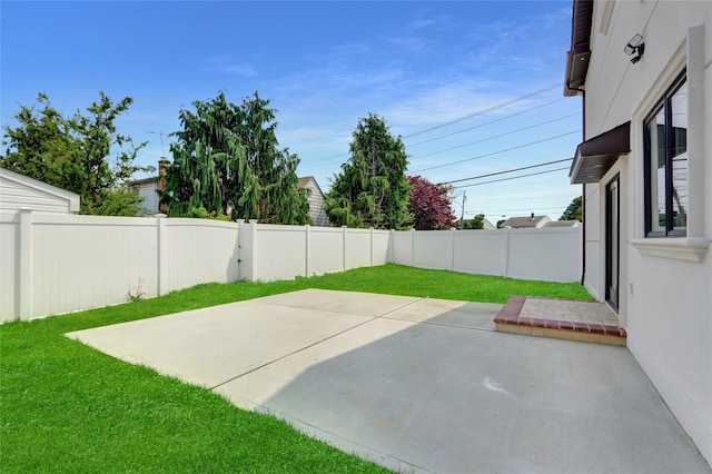 10 Locust St, Hicksville, NY 11801 - fenced backyard featuring a patio