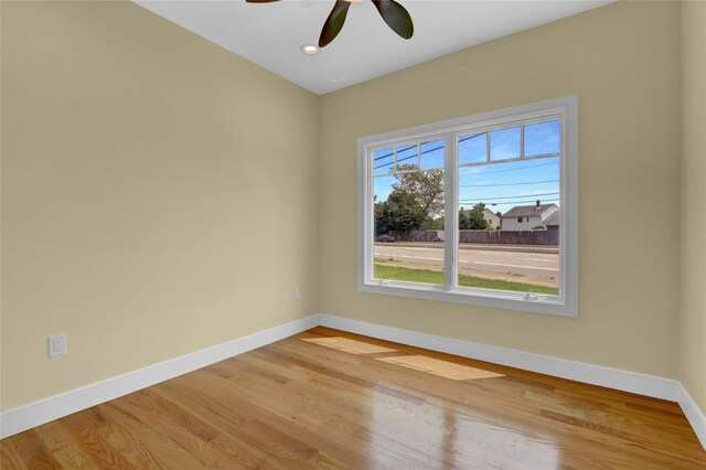 10 Locust St, Hicksville, NY 11801 - empty room with light wood-type flooring, ceiling fan, and recessed lighting