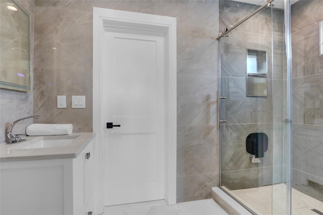 10 Locust St, Hicksville, NY 11801 - full bath with vanity, a shower stall, and tile walls