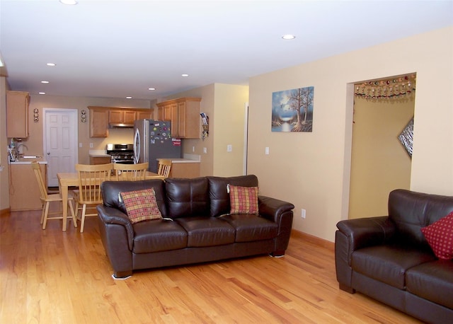 54 Gatelot Ave, Lake Ronkonkoma, NY 11779 - living area featuring light wood-type flooring and recessed lighting