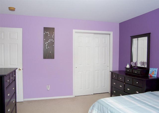 54 Gatelot Ave, Lake Ronkonkoma, NY 11779 - bedroom featuring light carpet and a closet