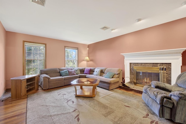 561 Toleman Rd, Rock Tavern, NY 12575 - living room featuring light wood finished floors and a high end fireplace