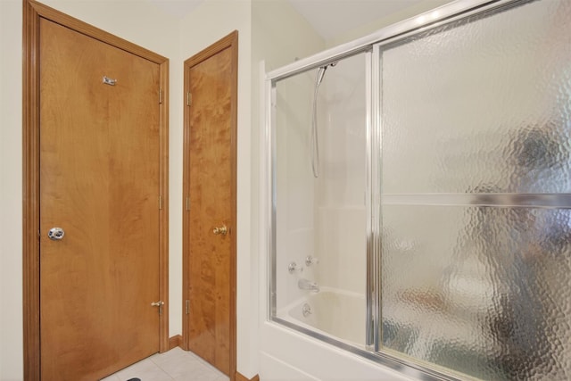 561 Toleman Rd, Rock Tavern, NY 12575 - bathroom with shower / bath combination with glass door and tile patterned flooring